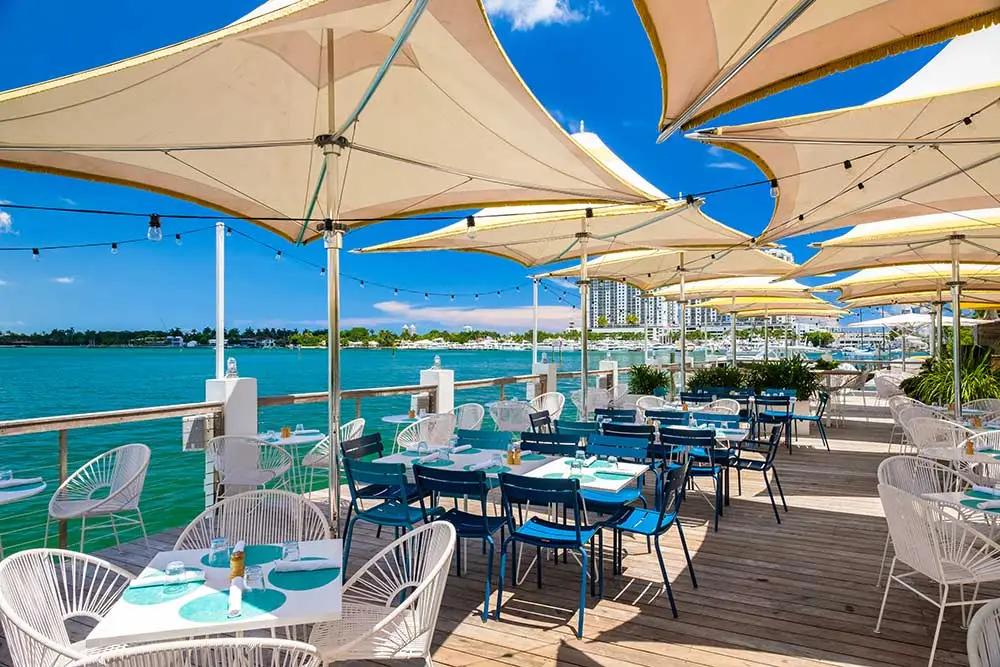 Exterior water-side seating area of Lido Bayside Grill